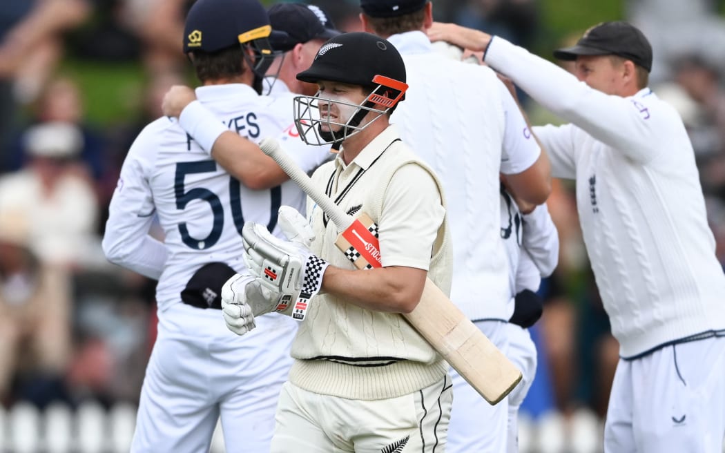 Henry Nicholls of New Zealand heads back to the dressing room.