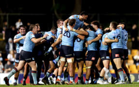 Waratahs players celebrate victory at full time during the Super Rugby Pacific Round 11 match between the NSW Waratahs and the Canterbury Crusaders at Leichhardt Oval in Sydney, Saturday, April 30, 2022.