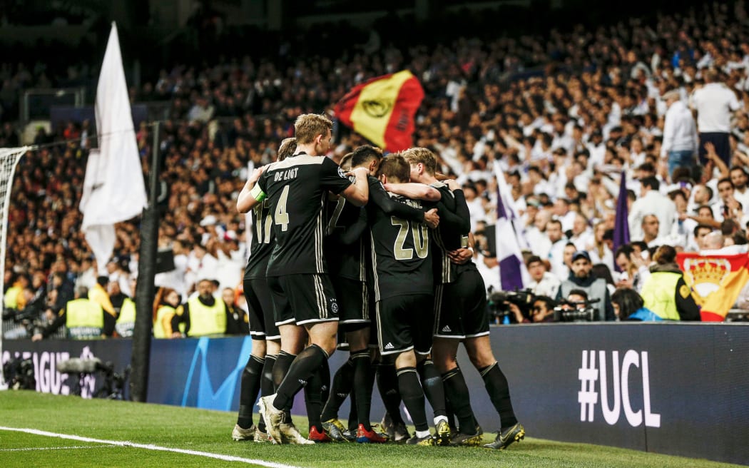 Ajax Amsterdam players celebrate.