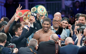 "Clash On The Dunes" Anthony Joshua celebrates after beating Andy Ruiz.