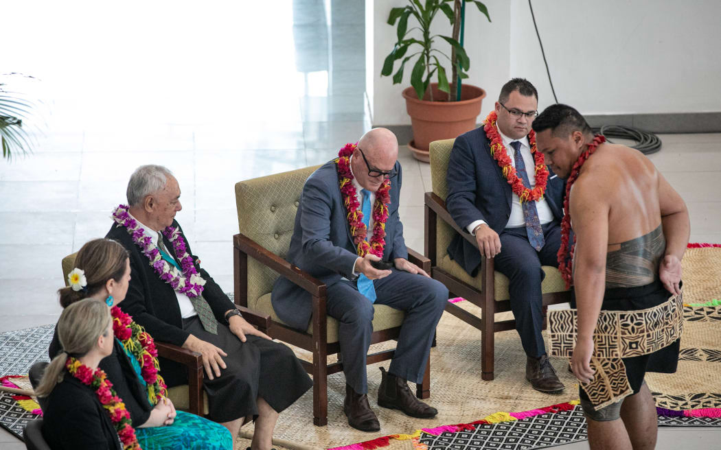 Todd Muller receives a shell of 'ava at a ceremony in Apia to welcome a group of New Zealand MPs on an inter-parliamentary visit to Samoa, 11 July 2023.