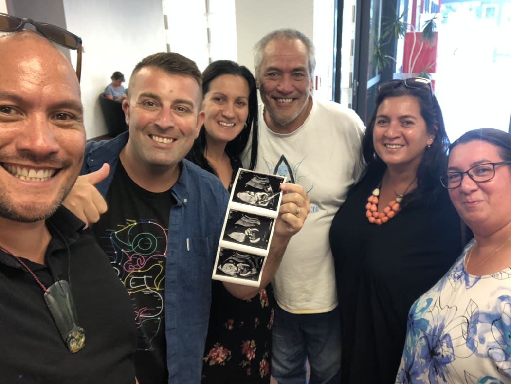 Tamati Coffey (left) with partner Tim Smith and surrogate mother Natasha Dalziel at their baby Tūtānekai’s first ultrasound scan. He wants to streamline New Zealand procedures so would-be parents do not have to use surrogates overseas.
