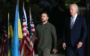 US President Joe Biden and Ukrainian President Volodymyr Zelensky arrive to give a press conference at the Masseria San Domenico on the sidelines of the G7 Summit hosted by Italy in Apulia region, on June 13, 2024 in Savelletri. Presidents Joe Biden and Volodymyr Zelensky signed a landmark US-Ukraine security deal on Thursday, as the US leader warned Russia's Vladimir Putin they were "not backing down". (Photo by Mandel NGAN / AFP)