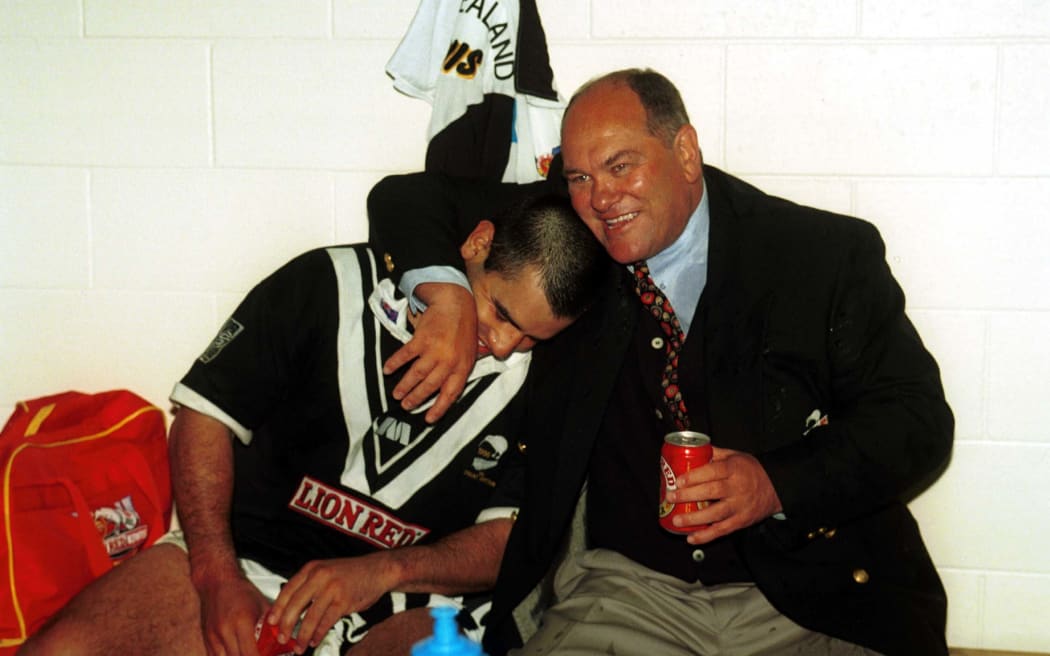 Kiwis halfback Stacey Jones gets a hug from coach Frank Endacott after winning the 1996 series between New Zealand and Great Britain.