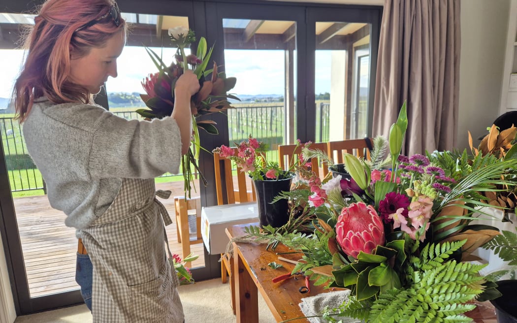 From her dining room table just south of Gisborne, Kate Briant makes beautiful bouquets from blooms she's grown herself.