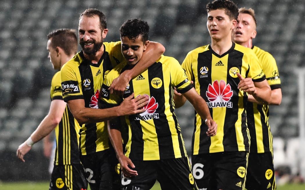 Wellington Phoenix Sarpreet Singh celebrates a goal with teammates during a match against Melbourne City FC.
Wellington Phoenix v Melbourne City FC, Hyundai A-League, QBE Stadium, Auckland, New Zealand. 14 April 2018. © Copyright Image: Marc Shannon / www.photosport.nz.