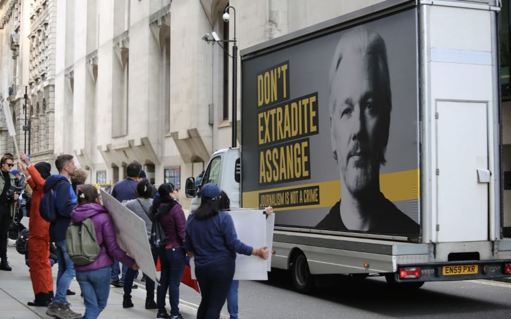Supporters of WikiLeaks founder Julian Assange demonstrate outside the Central Criminal Court (Old Bailey) after Julian Assange appeared in court for a full extradition hearing on the last day of the trials in London, United Kingdom  Hasan Esen / Anadolu Agency