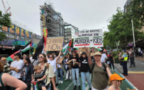 Marchers work their way down Queen Street at Sunday's protest march for a ceasefire in Israel/Gaza.
