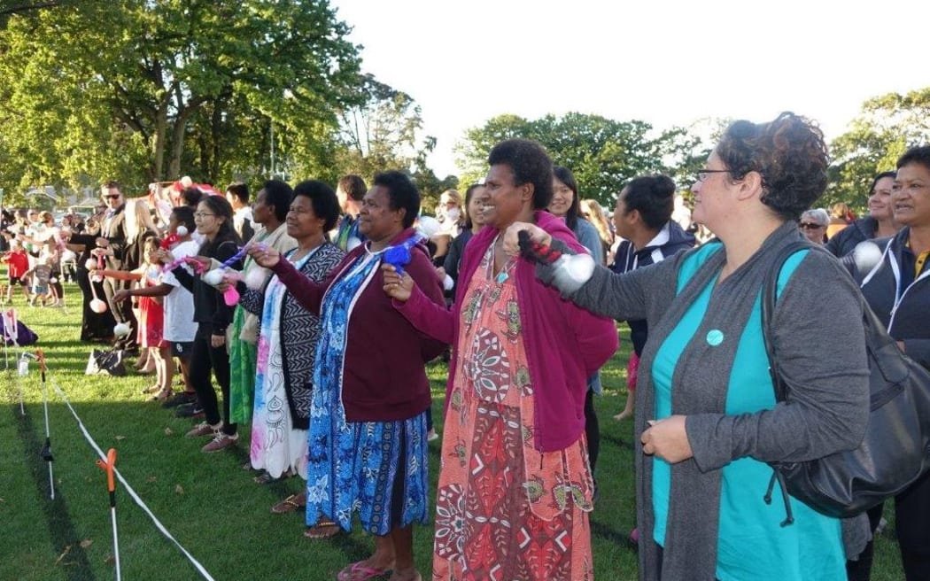 247 people lined up in Nelson to set a poi swinging record, which fell short by 4 people