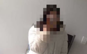 The woman sent the victim this, but unpixelated, photo of herself, taken inside the victim's bathroom.