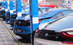 --FILE--Electric vehicles of BMW i8 are being recharged at a BMW's charging station in Shanghai, China, 11 May 2016.

German carmaker BMW said it will raise the prices of two US-made crossover sport utility vehicles (SUV) in China to cope with the additional cost of tariffs on US car imports into the world's biggest auto market. In a move due to take effect on Monday (30 July 2018), BMW said in a statement to Reuters over the weekend that it will increase suggested retail prices of the popular, relatively high-margin X5 and X6 SUV models by 4 percent to 7 percent. The rates of increase suggest that BMW is willing to absorb much of the higher costs stemming from bringing the SUVs to China from its factory in South Carolina, underscoring the fierce competition among luxury car brands in China. BMW's move comes after China imposed new tariffs earlier this month on about $34 billion of US...