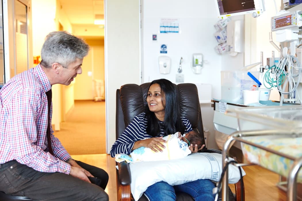 Frank Bloomfield wtih Meeta Raval of Auckland and her baby boy Arjun.