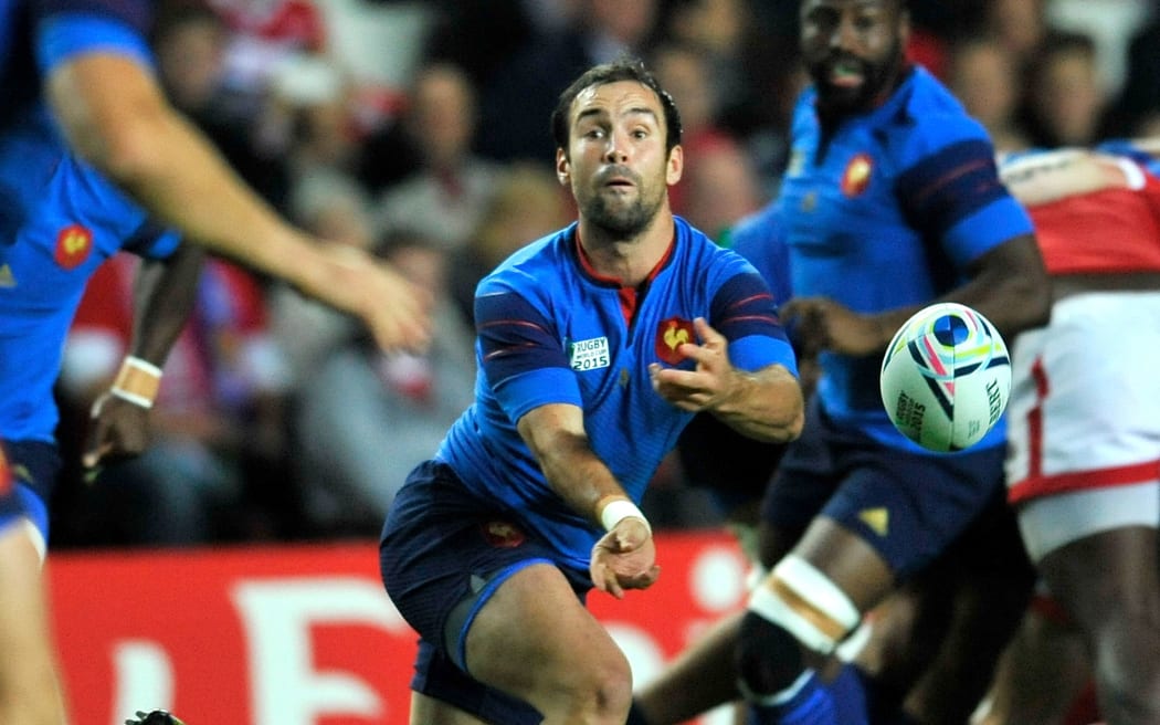 Morgan Parra of France clears the ball.