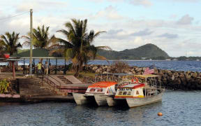 The tiny Aunu'u is only 3 square kilometres with a population of 600 and features an expanse of red quicksand known as Pala Lake.