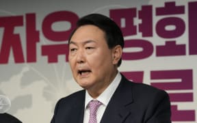 Yoon Suk-yeol, the presidential election candidate for South Korea's main opposition People Power Party (PPP), speaks during a press conference at the party's headquarters in Seoul on January 24, 2022. (Photo by Ahn Young-joon / POOL / AFP)