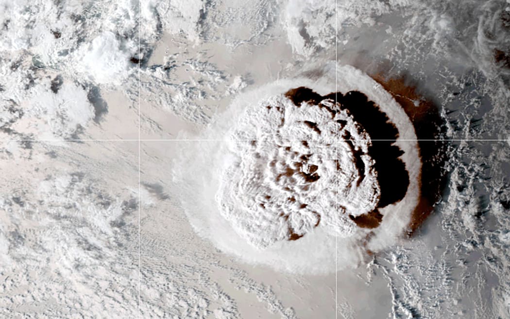 A grab taken from the NOAA GOES-West satellite on January 15, 2022 and obtained via NASA shows the eruption of the Hunga-Tonga-Hunga-Haa'pai volcano in Tonga that provoked a tsunami. (Photo by Handout / NASA/NOAA / AFP) / RESTRICTED TO EDITORIAL USE - MANDATORY CREDIT "AFP PHOTO /NASA/NOAA" - NO MARKETING - NO ADVERTISING CAMPAIGNS - DISTRIBUTED AS A SERVICE TO CLIENTS