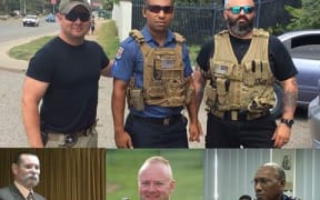 Personnel from US security firm Laurence Aviation & Security Group flank a Papua New Guinea policeman.