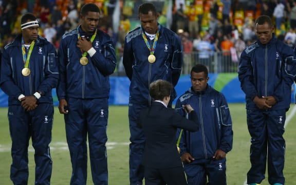 The Fiji men's rugby sevens team won the country its first-ever Olympic medal, easily beating Great Britain in the final.