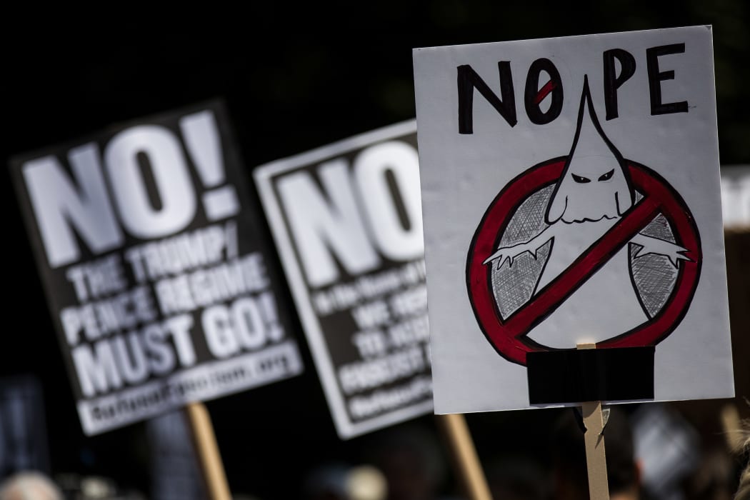 Protestors rally against white supremacy and racism in Columbus Circle on August 13, 2017 in New York City following clashes between white supremacists and counter-protestors in Charlottesville, Virginia.