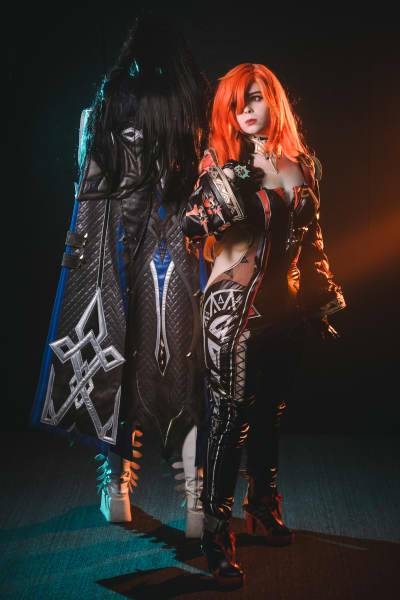 Cosplayers Madis and Anxiousay dressed as Mavuika and Capitano from Genshin Impact.