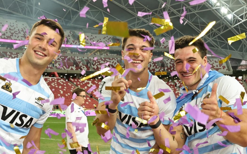Argentina celebrate their series win in Singapore.