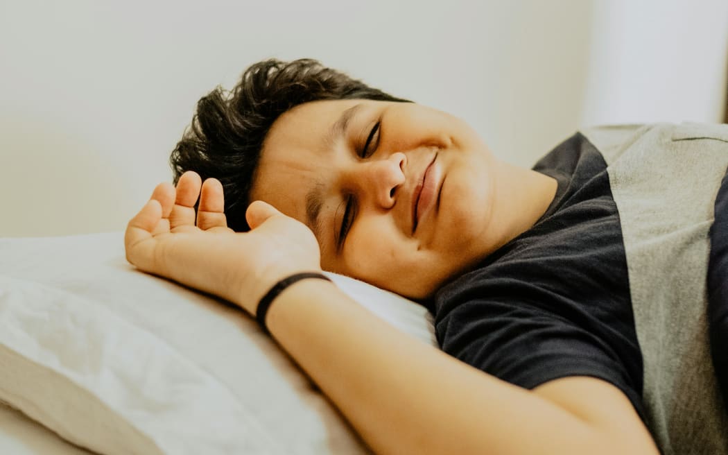 happy boy in bed