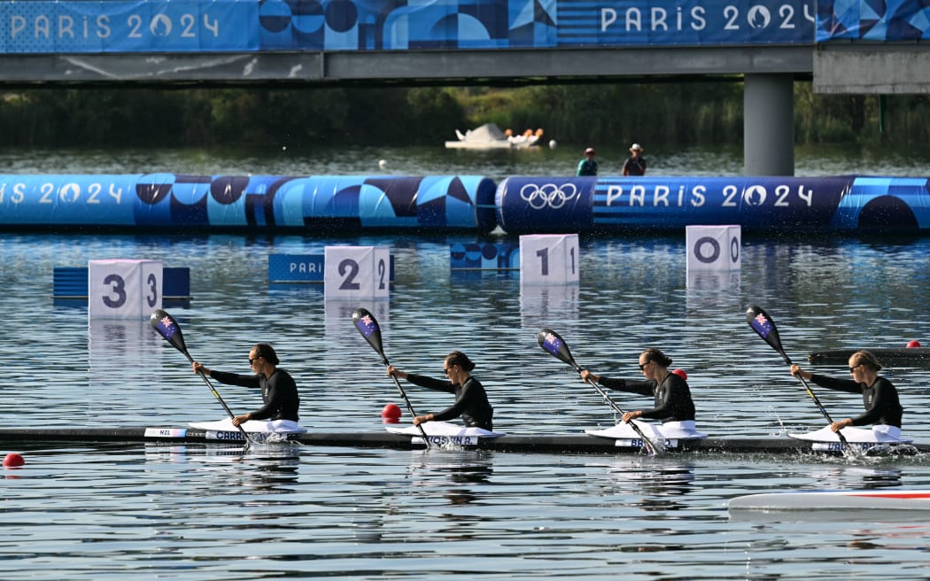 (From L) New Zealand's Lisa Carrington, New Zealand's Alicia Hoskin, New Zealand's Olivia Brett and New Zealand's Tara Vaughan compete in the women's kayak four 500m heats of the canoe sprint competition at Vaires-sur-Marne Nautical Stadium in Vaires-sur-Marne during the Paris 2024 Olympic Games on August 6, 2024. (Photo by Bertrand GUAY / AFP)