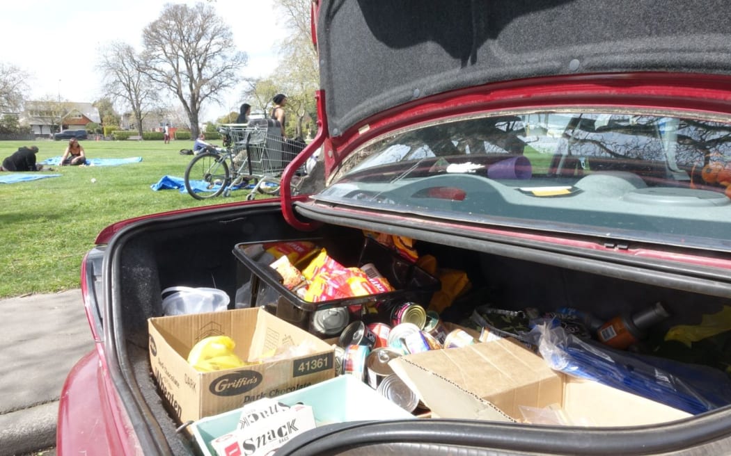 Charities give out food and clothing each week.