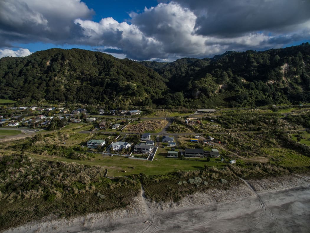 Some residential homes in Matata have been told by council that they are in an area at threat of a deadly landslip but residents don't agree.