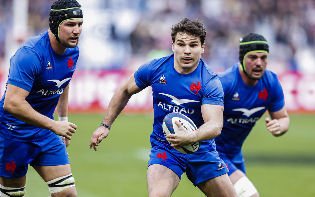 Antoine Dupont of France runs with the ball during the Six Nations Rugby match between France and Wales at Stade de France on 18 March in Paris, France.