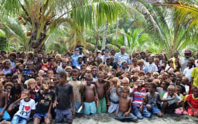 Locals gather to meet with RAMSI staff in  Guadalcanal.