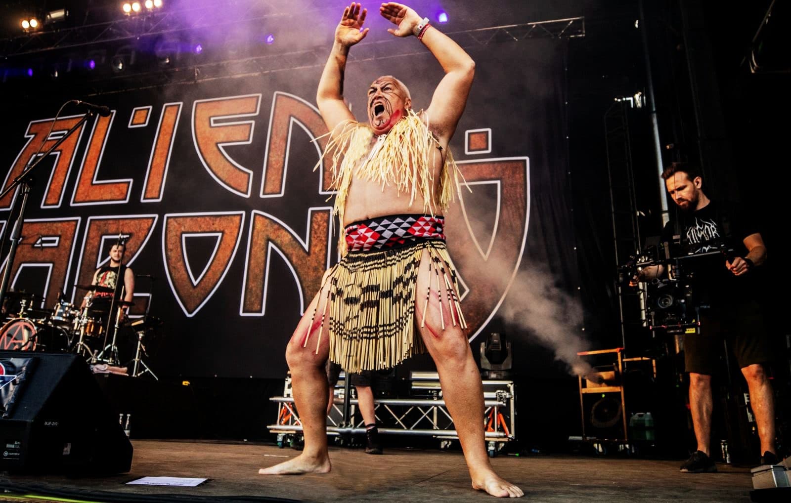 Kane Harnett-Mutu performing a haka before a performance by New Zealand band Alien Weaponry at a heavy metal festival in Denmark.