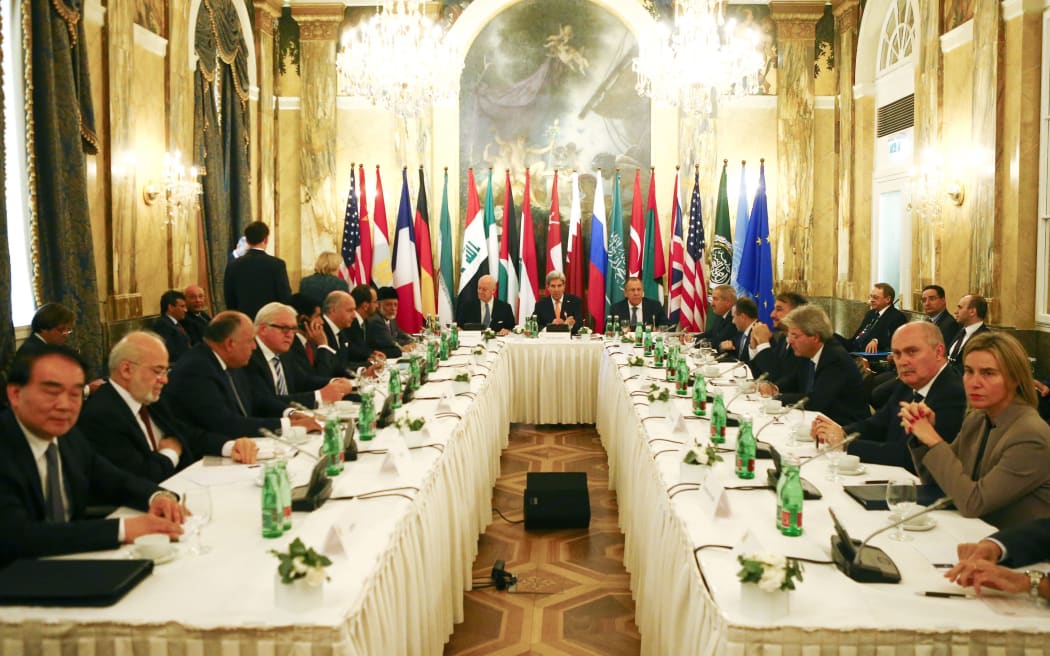 Russia's Foreign Minister Sergei Lavrov (centre right), US Secretary of State John Kerry (centre) and Foreign Ministers at a conference on the Syria conflict in Vienna.