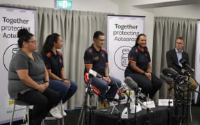 Some of the border workers to be vaccinated against Covid-19 and Director-General of Health Dr Ashley Bloomfield (right) at a media briefing.