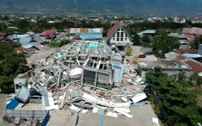 This aerial picture shows the remains of a ten-storey hotel in Palu in Indonesia's Central Sulawesi.