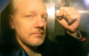 Julian Assange arrives at court in London on 1 May 2019 to be sentenced for bail violation.