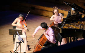 Gedalge Trio performing on stage at Auckland Town Hall