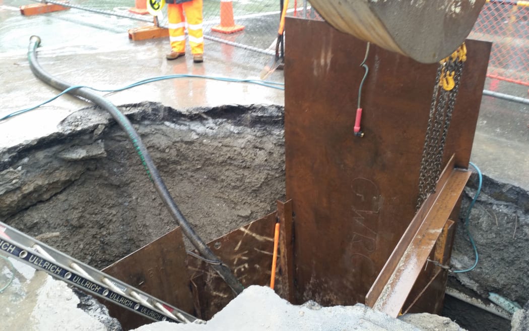 The access hole used to repair the crack in the pipe found by contractors.