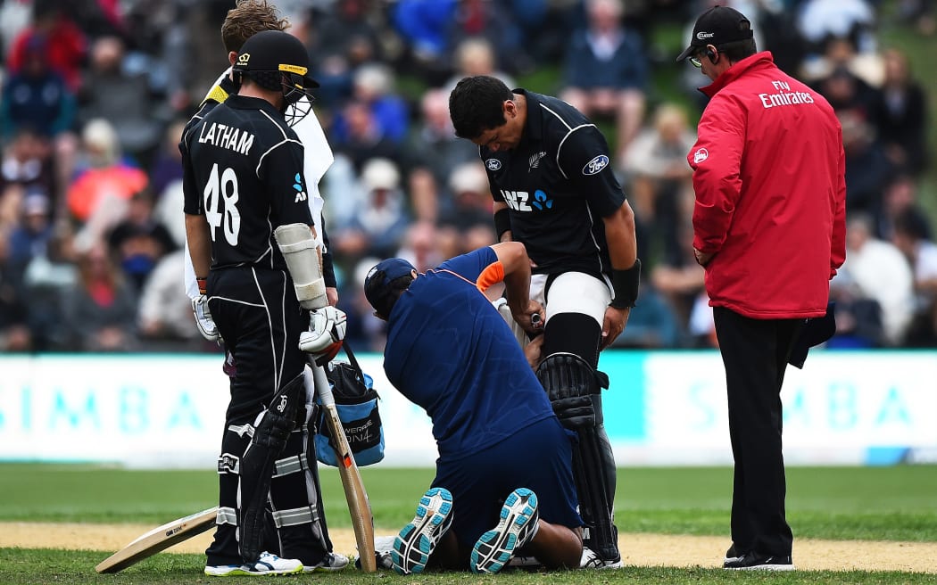 Blackcaps Ross Taylor receives treatment for his thigh injury.
