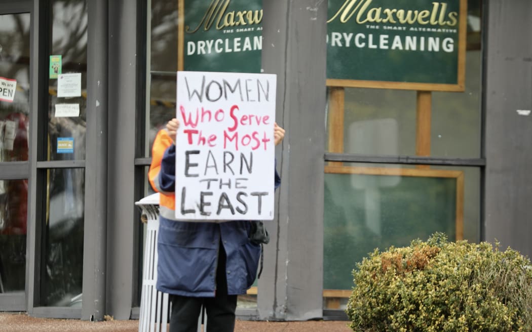 A protest against the controversial pay equity law change outside the Tāmaki  electorate  office of Workplace Relations and Safety Minister Brooke van Velden.