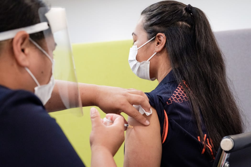 Auckland Jet Park Hotel quarantine facility worker Lorna Masoe receiving the Covid-19 vaccine on 20 February 2021.