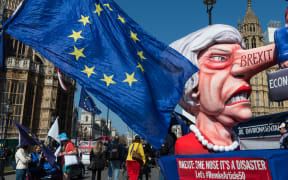 A float with a caricature of British Prime Minister Theresa as Pinocchio stands outside the Houses of Parliament during pro-EU protest on 01 April, 2019 in London, England.