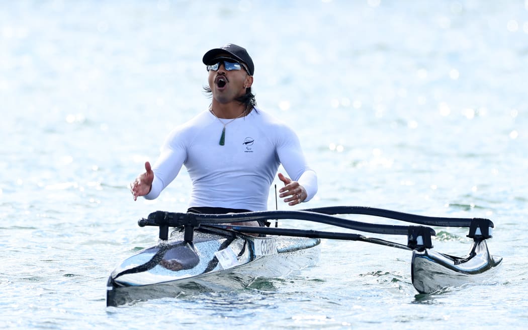 PARIS, FRANCE - SEPTEMBER 08: Peter Cowan of Team New Zealand celebrates finishing third during the Men's Va'a Single 200m VL3 Final on day eleven of the Paris 2024 Summer Paralympic Games at Vaires-Sur-Marne Nautical Stadium on September 08, 2024 in Paris, France. (Photo by Fiona Goodall/Getty Images for PNZ)