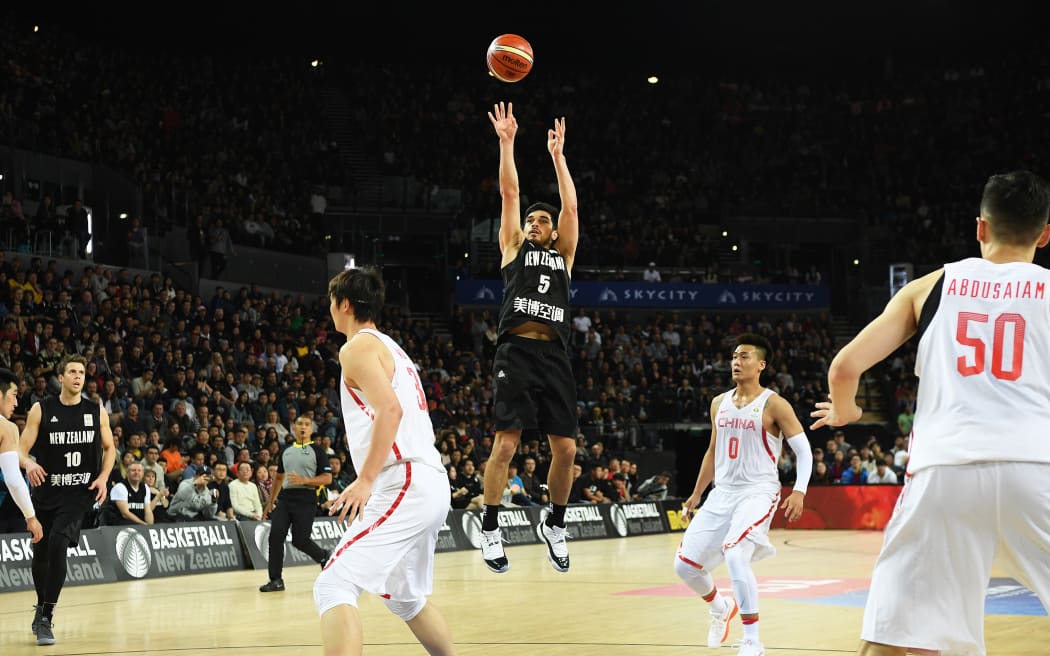 Tall Blacks point guard Shea Ili attempts a jumper against China.