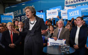 British Prime Minister Theresa May, is accompanied by Britain's Foreign Secretary Boris Johnson as she addresses supporters at a campaign event in Slough in south-east England.