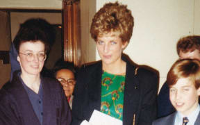 *Under embargo until 0001 BST, October 27, 2024* This handout photograph released by Kensington Palace on October 25, 2024, shows Britain's Princess Diana (C) with her 11-year-old son William (R), now Britain's Prince William, Prince of Wales during one of his first visits to homelessness charity, The Passage in London, taken on December 14, 1993. - "Prince William: We Can End Homelessness" – a two-part documentary series which follows the first year of The Prince’s Homewards programme will be shown on ITV on Wednesday October, 30 and Thursday October 31, 2024. (Photo by THE PASSAGE / AFP) / NO USE AFTER DECEMBER 31, 2024 00:00:00 GMT - RESTRICTED TO EDITORIAL USE - MANDATORY CREDIT "AFP PHOTO / THE PASSAGE " - NO MARKETING - NO ADVERTISING CAMPAIGNS - NO DIGITAL ALTERATION ALLOWED - DISTRIBUTED AS A SERVICE TO CLIENTS - NO ARCHIVE - NOT TO BE USED AFTER DECEMBER 31, 2024 / *Under embargo until 0001 BST, October 27, 2024*