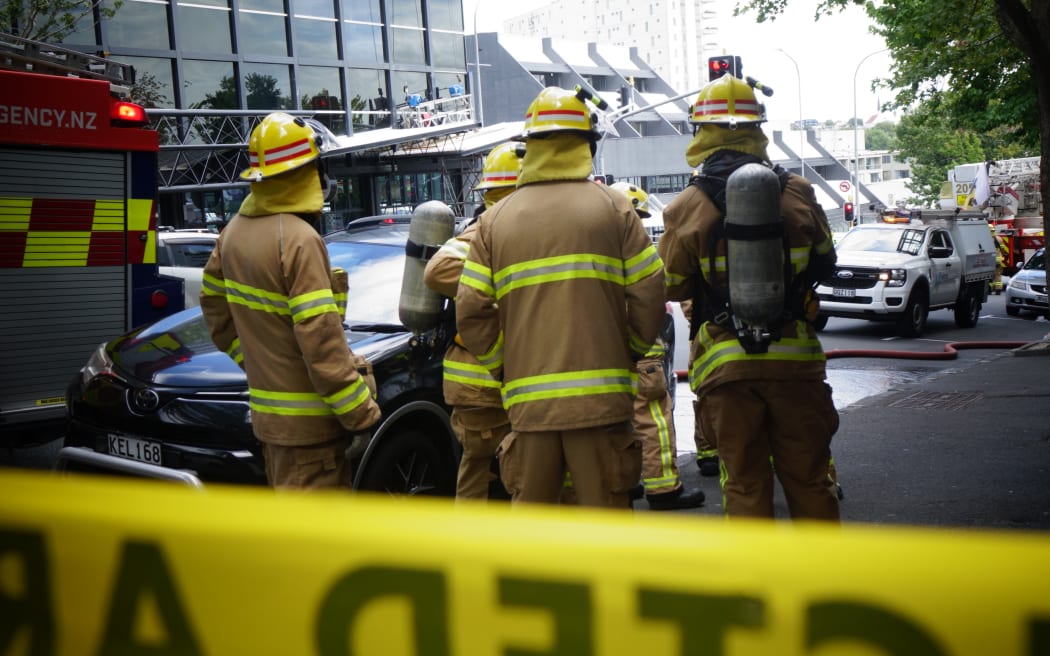 Fire crews on the scene of an apartment fire at the corner of Nelson and Cook Streets in central Auckland on 13 January 2026.