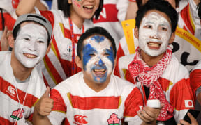 Fans await the start of the Japan 2019 Rugby World Cup Pool A match between Japan and Scotland at the International Stadium Yokohama in Yokohama on October 13, 2019.