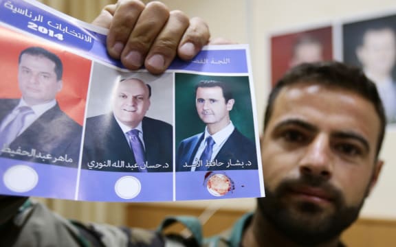 A ballot paper with candidates from left, Maher Abdel Hafiz Hajjar, Hassan Abdallah al-Nuri and President Bashar al-Assad.