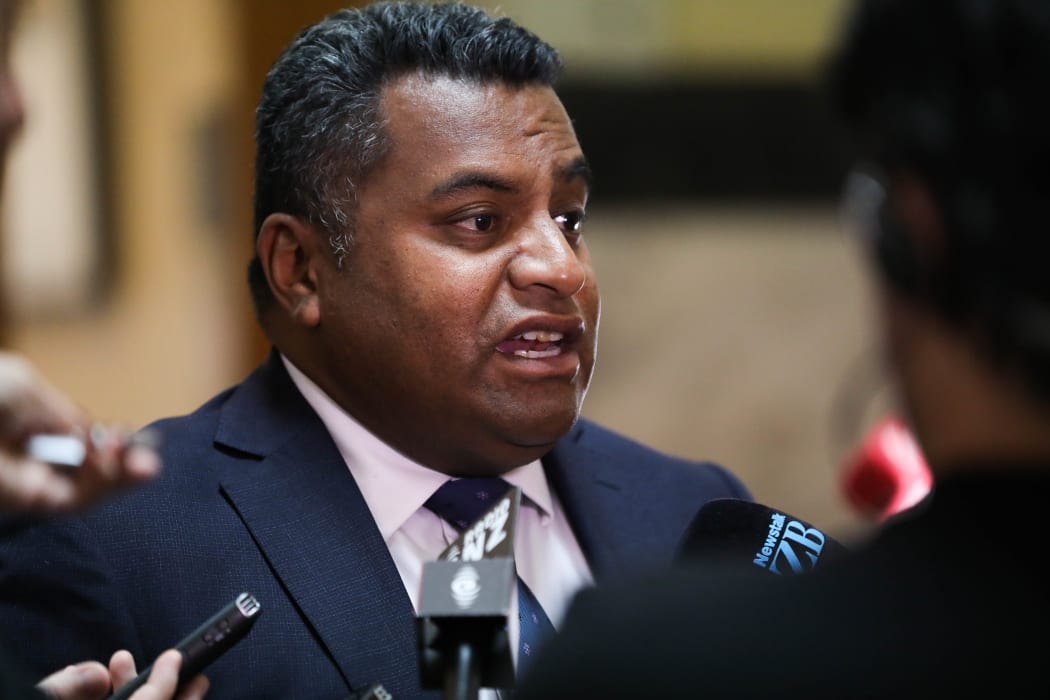 Minister of Civil Defence Kris Faafoi speaks to media before heading into the debating chamber at parliament.